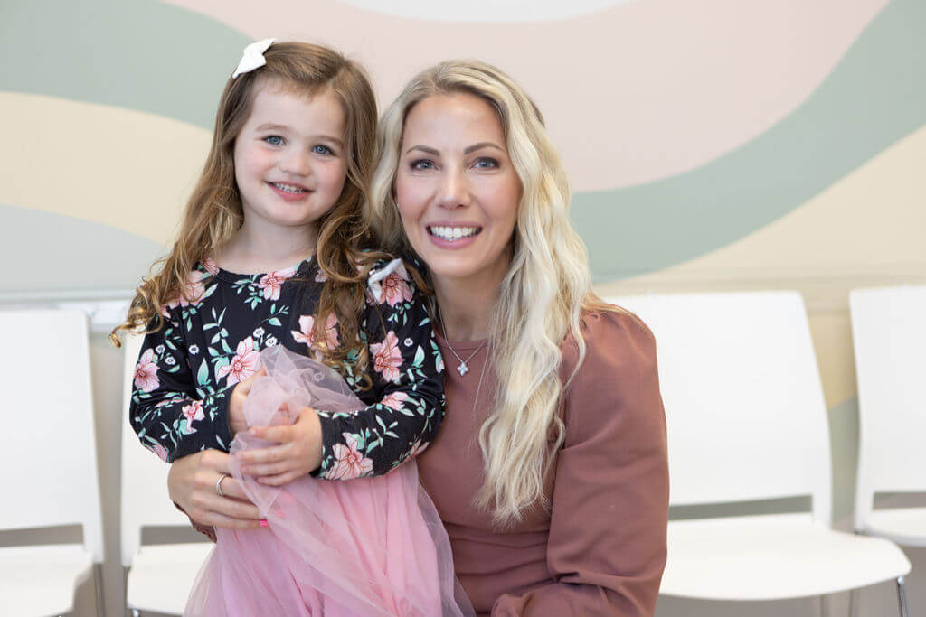 Woman Smiling With Child